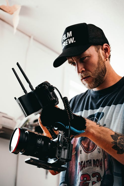 a man holding a camera.