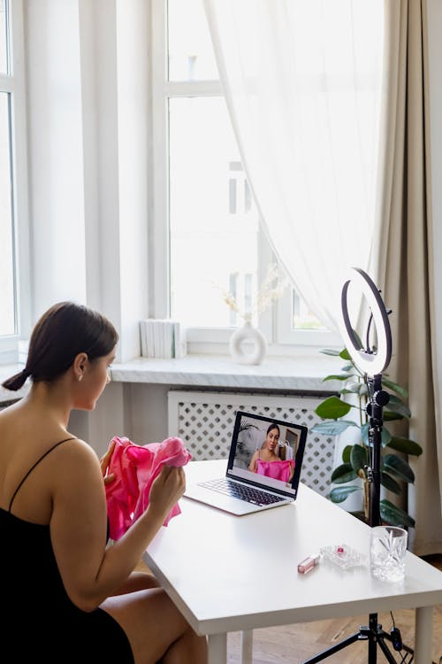 a woman recording herself.