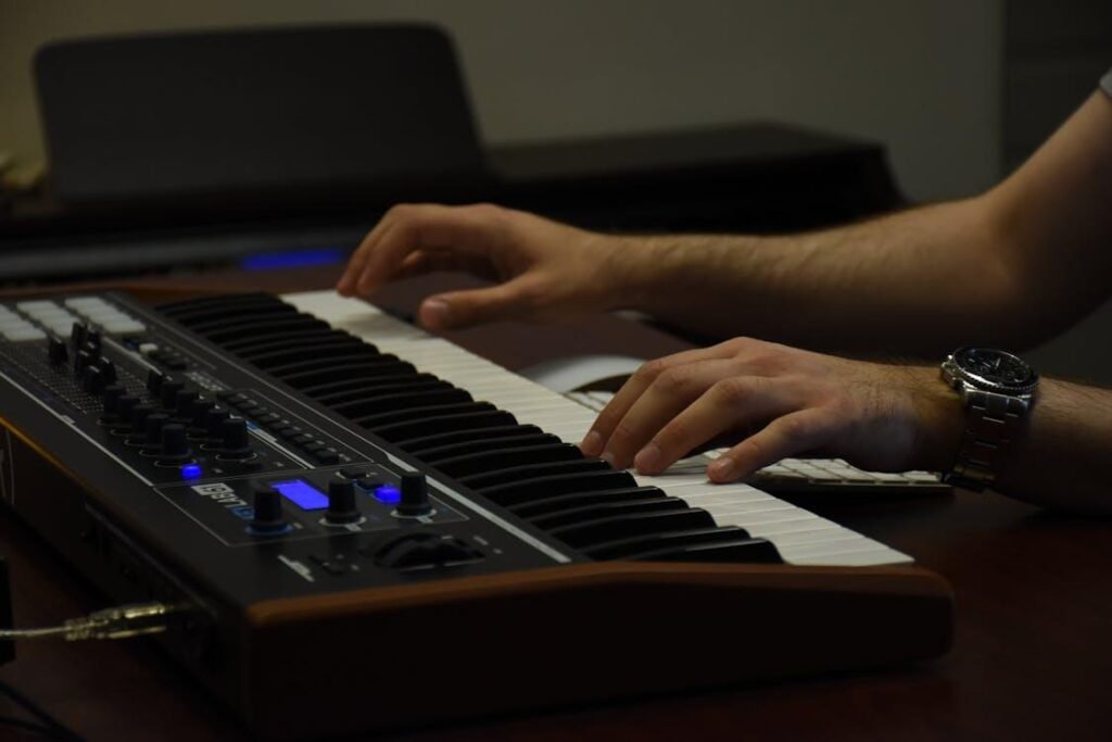 A person playing an electric piano