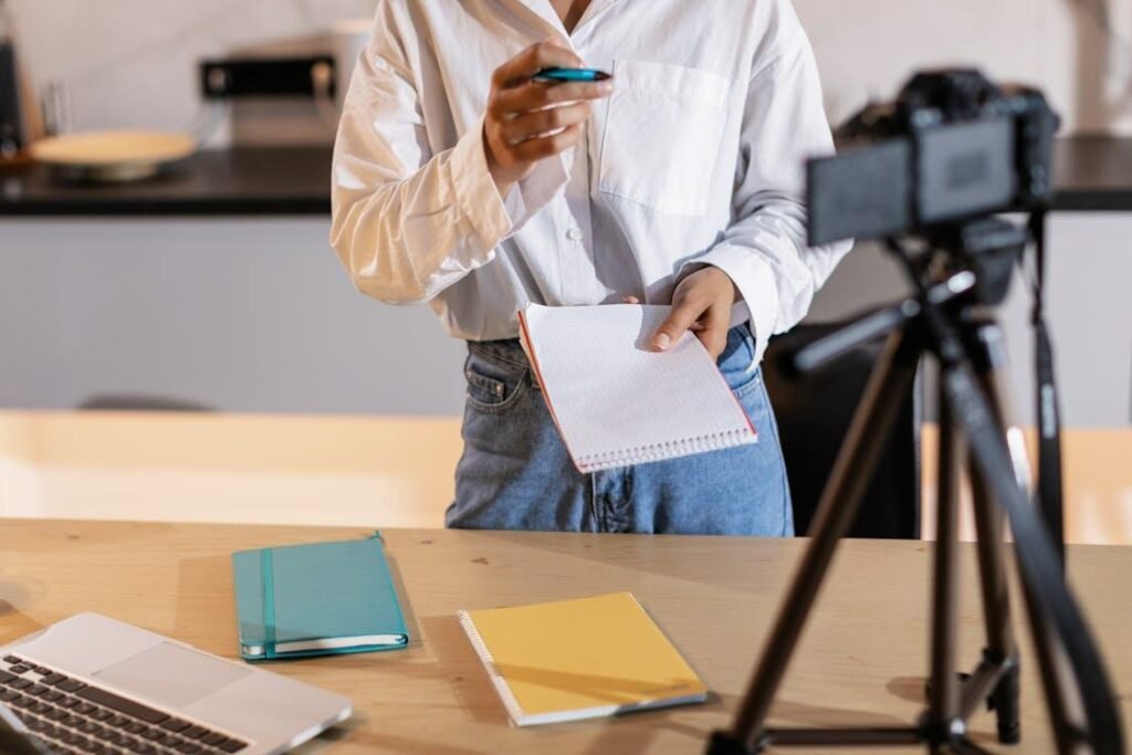A person recording themselves in front of the camera