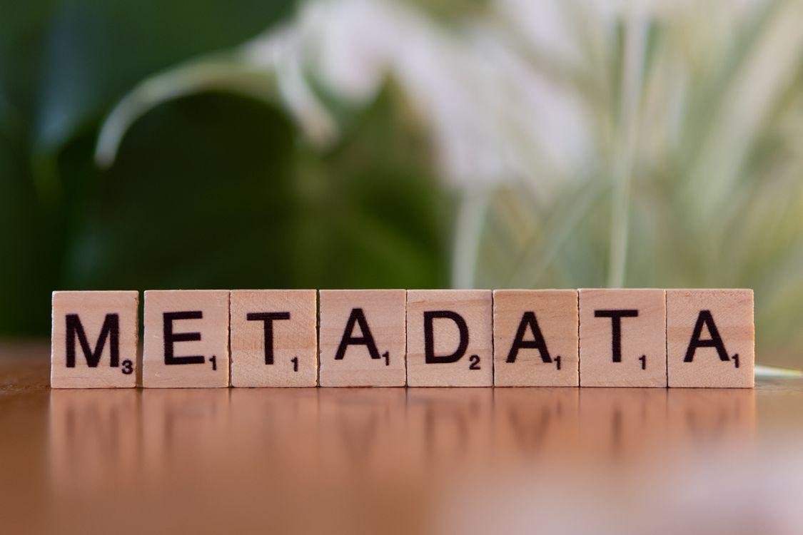 Wooden blocks spelling ‘metadata’